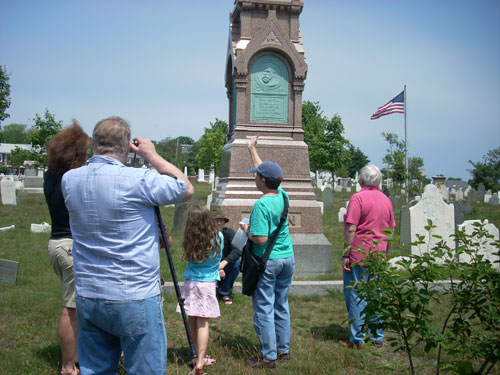 barb informs a group about the Alden monument