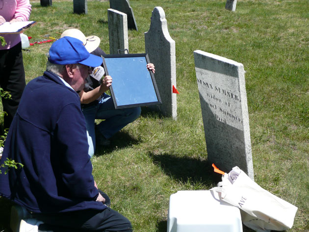 reading a stone using a mirror