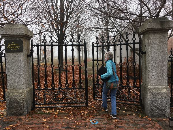 Janet opens the Congress Street gates in the fall leaves