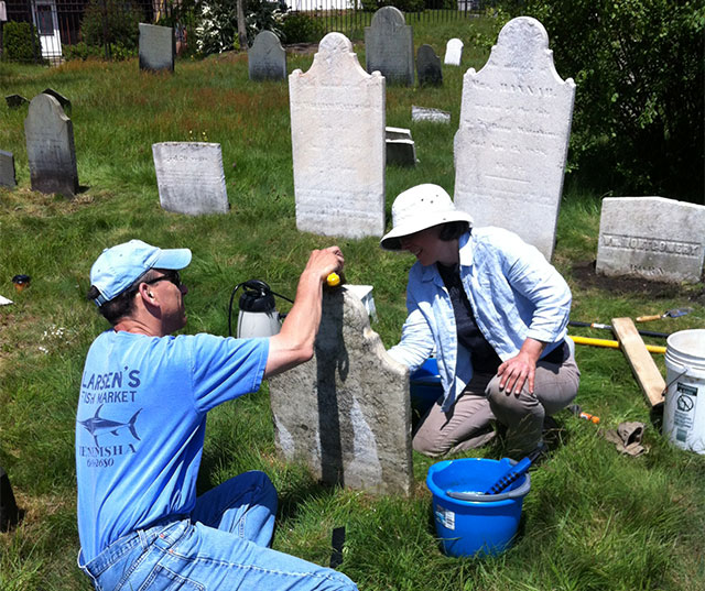 washing gravestones