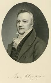 oval portrait of Asa Clapp who wears an overcoat, vest, and a light-colored shirt with a high-neck, frilly collar