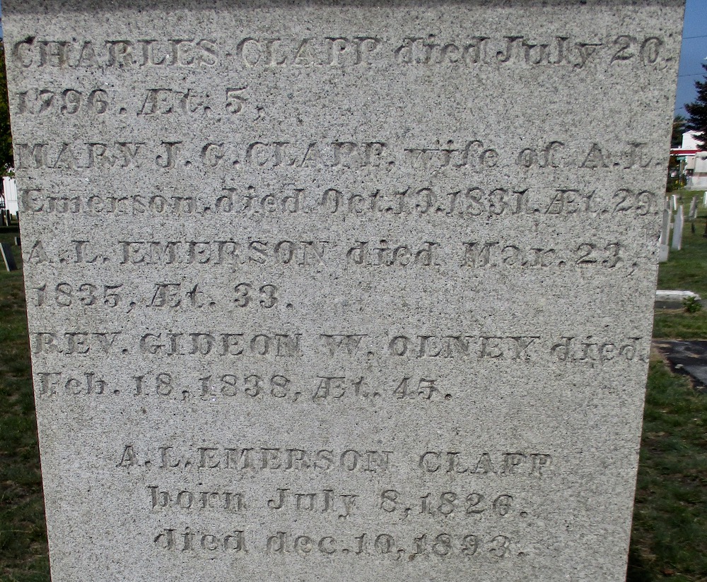 detail of an old granite grave monument for Charles Clapp, Mary, AL Emerson, Rev. Gideon Olney, AL Emerson Clapp